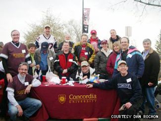 Members of Calgary’s alumni chapter enjoy a tailgate reception after a football game. Chapter president Dan Rochon is at the extreme right.